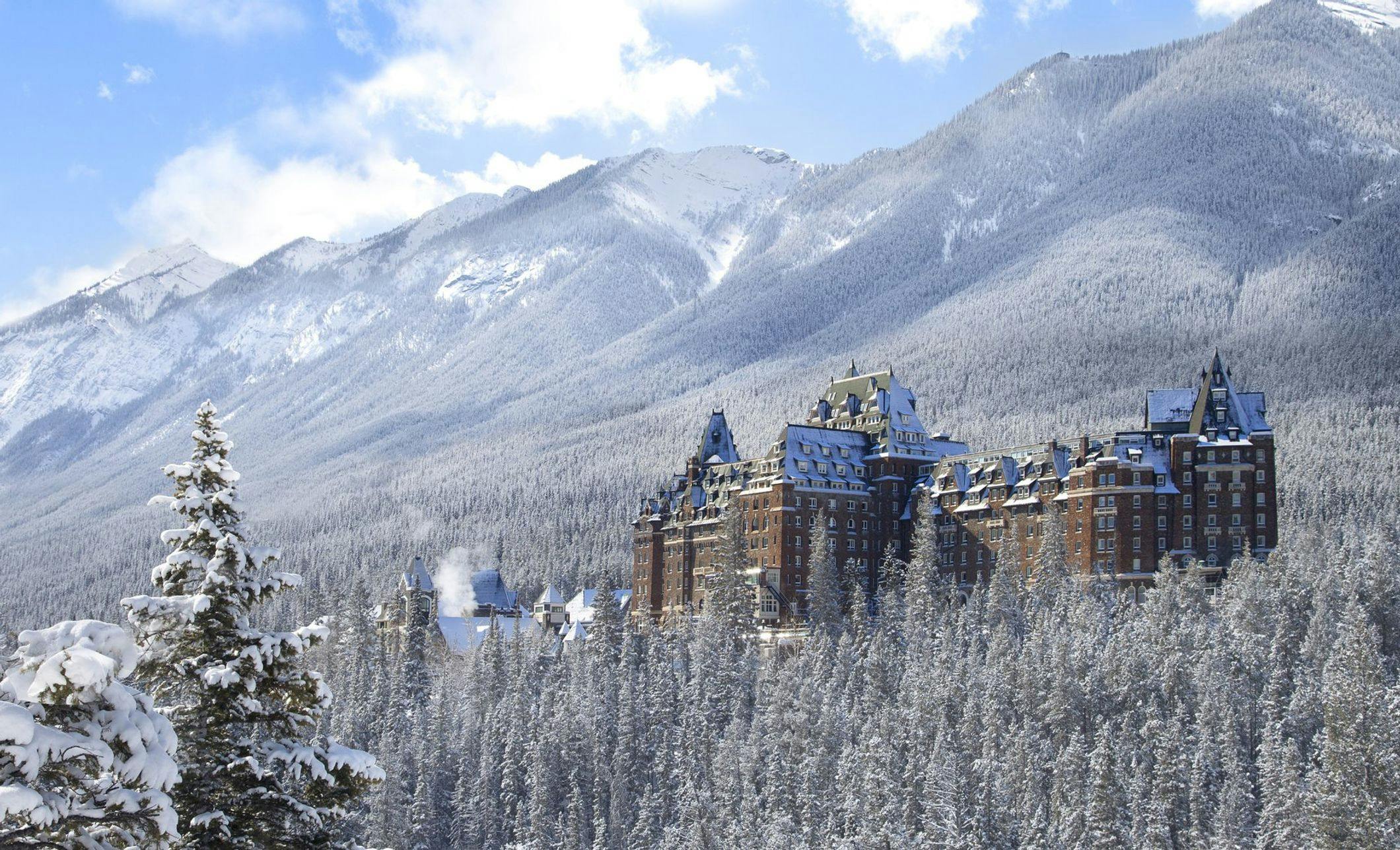 The Castle in the Canadian Rockies - the Fairmont Banff Springs - surrounded by snow. 