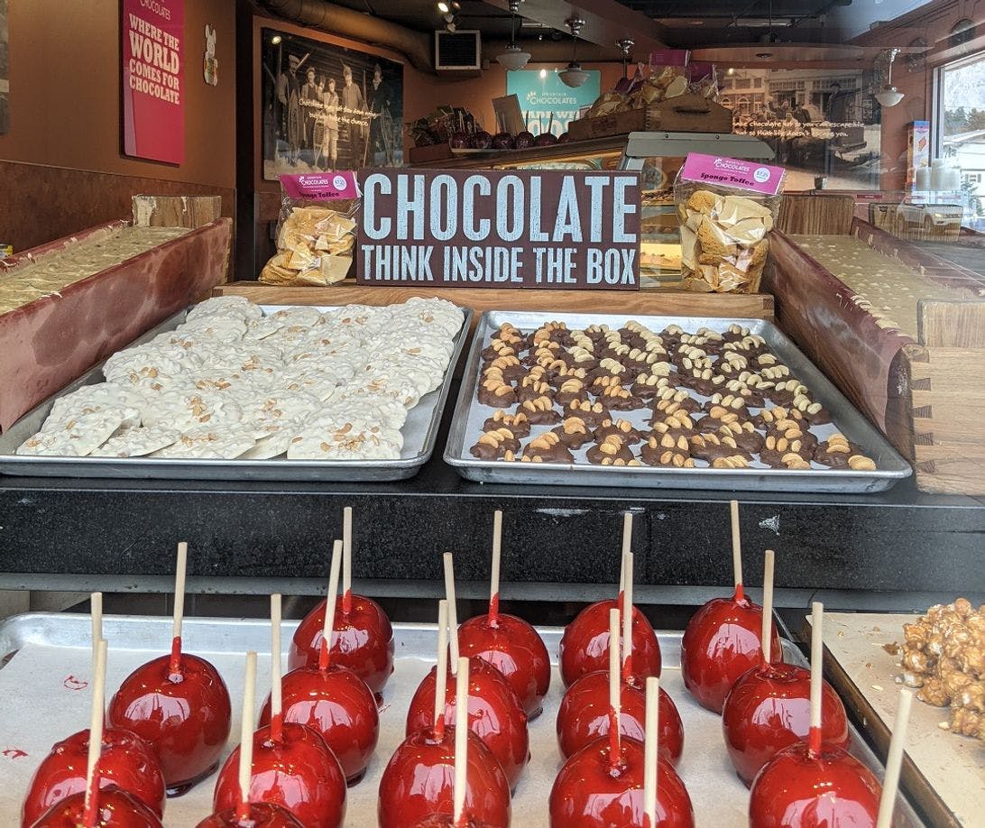 A selection of chocolate treats and candy apples