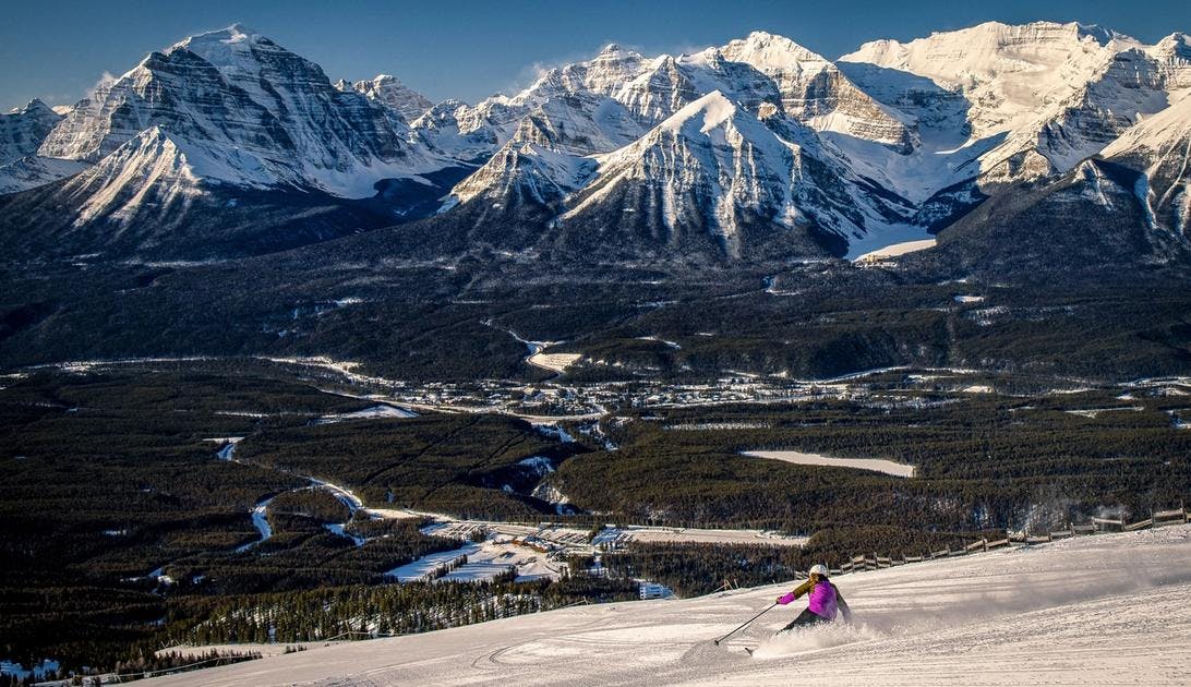 Downhill skier at Lake Louise Ski Resort in Banff National Park.