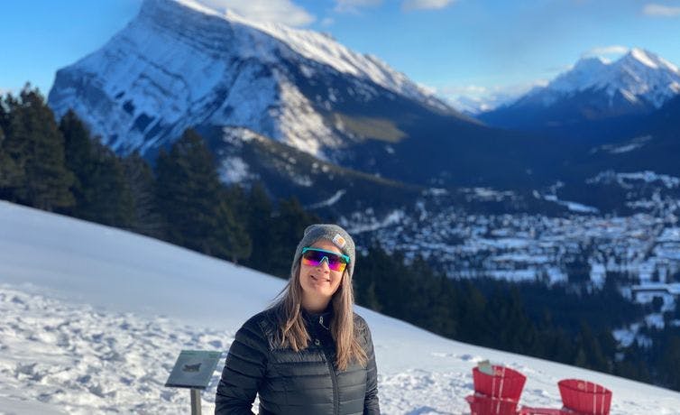 Local expert Jess hiking up Tunnel Mountain