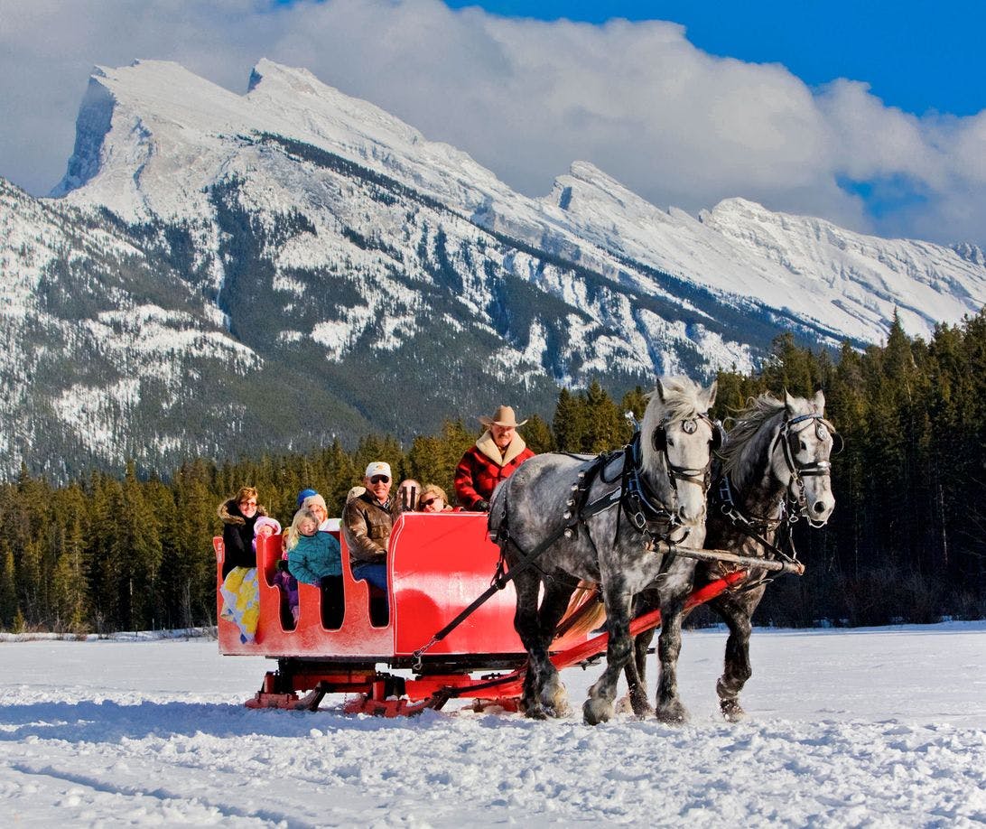 Sleigh Ride with Mt. Rundle in the background, Banff National Park, AB