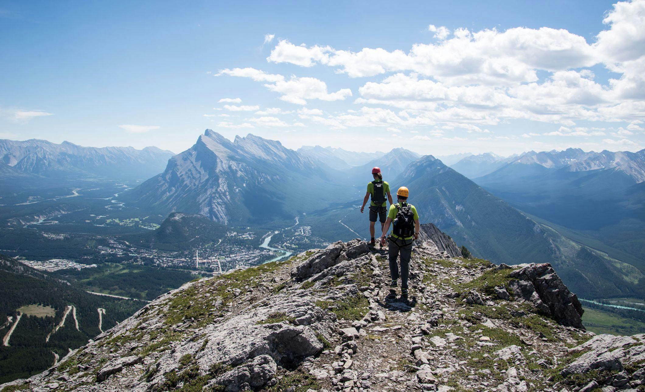 Climbers reach the summit of the Mt. Norquay Via Ferrata, Banff National Park, AB