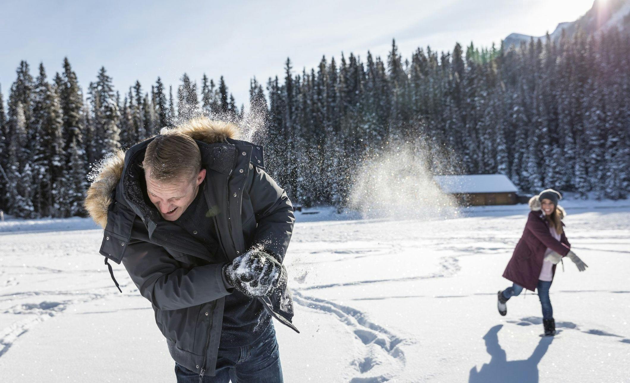Fairmont Chateau Lake Louise couple snowball fight