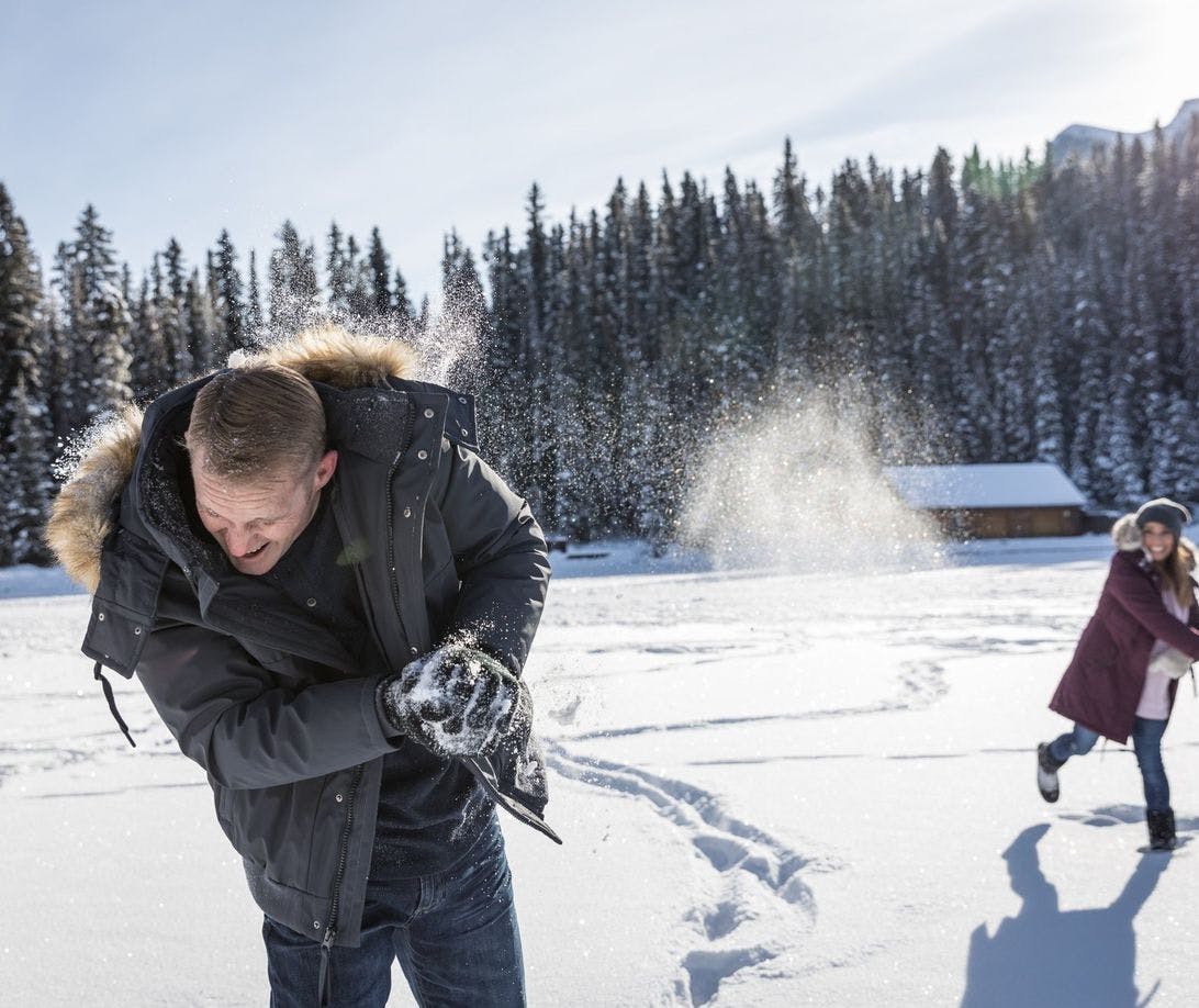 Fairmont Chateau Lake Louise couple snowball fight