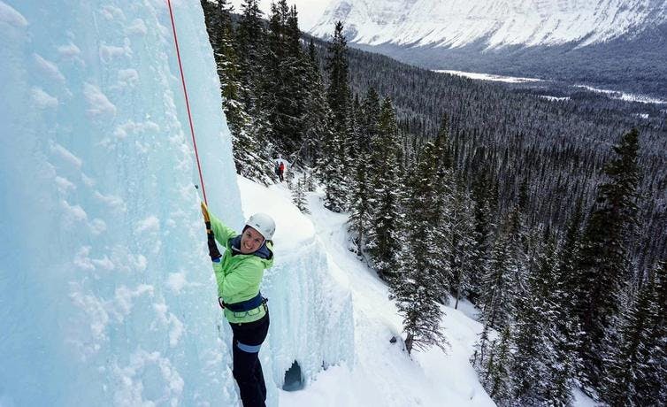 VC local expert Delaney ice climbing