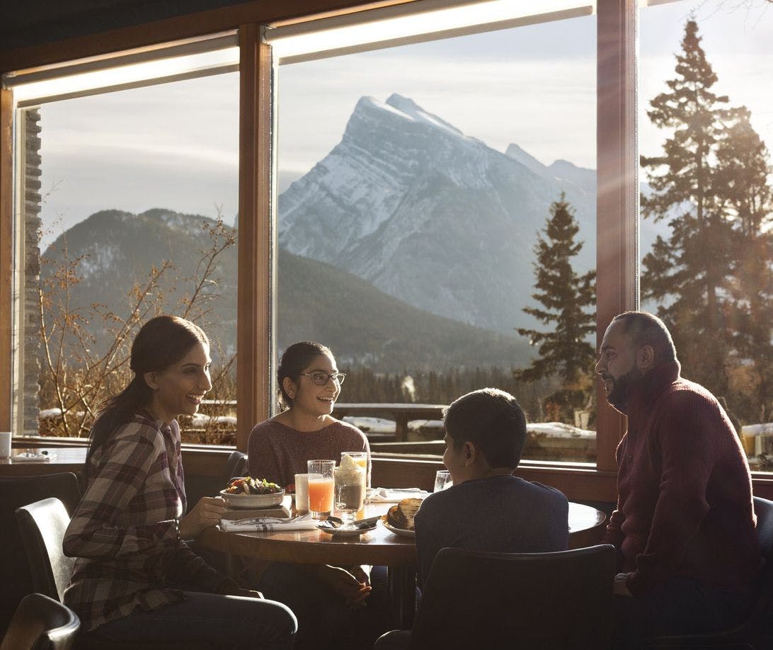 Family eating at Juniper Bistro in Banff.