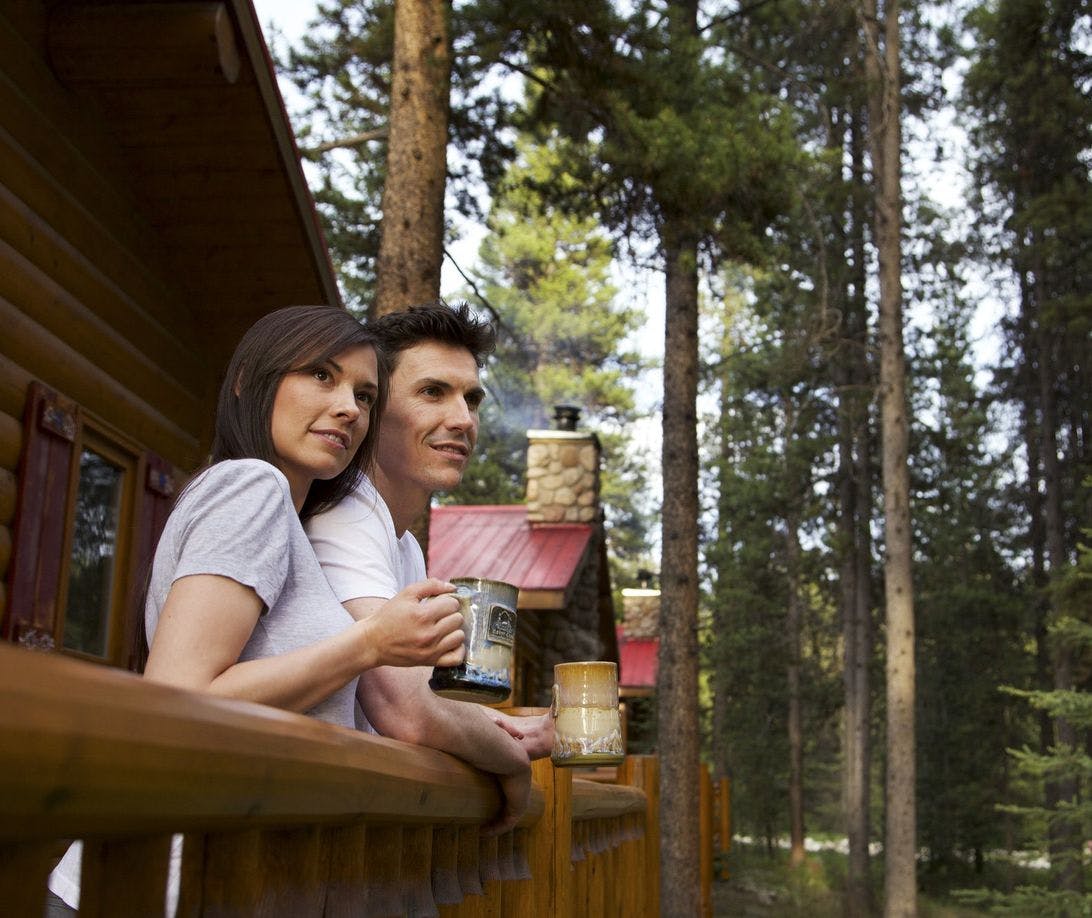 Couple staying in a cozy cabin at Baker Creek Resorts