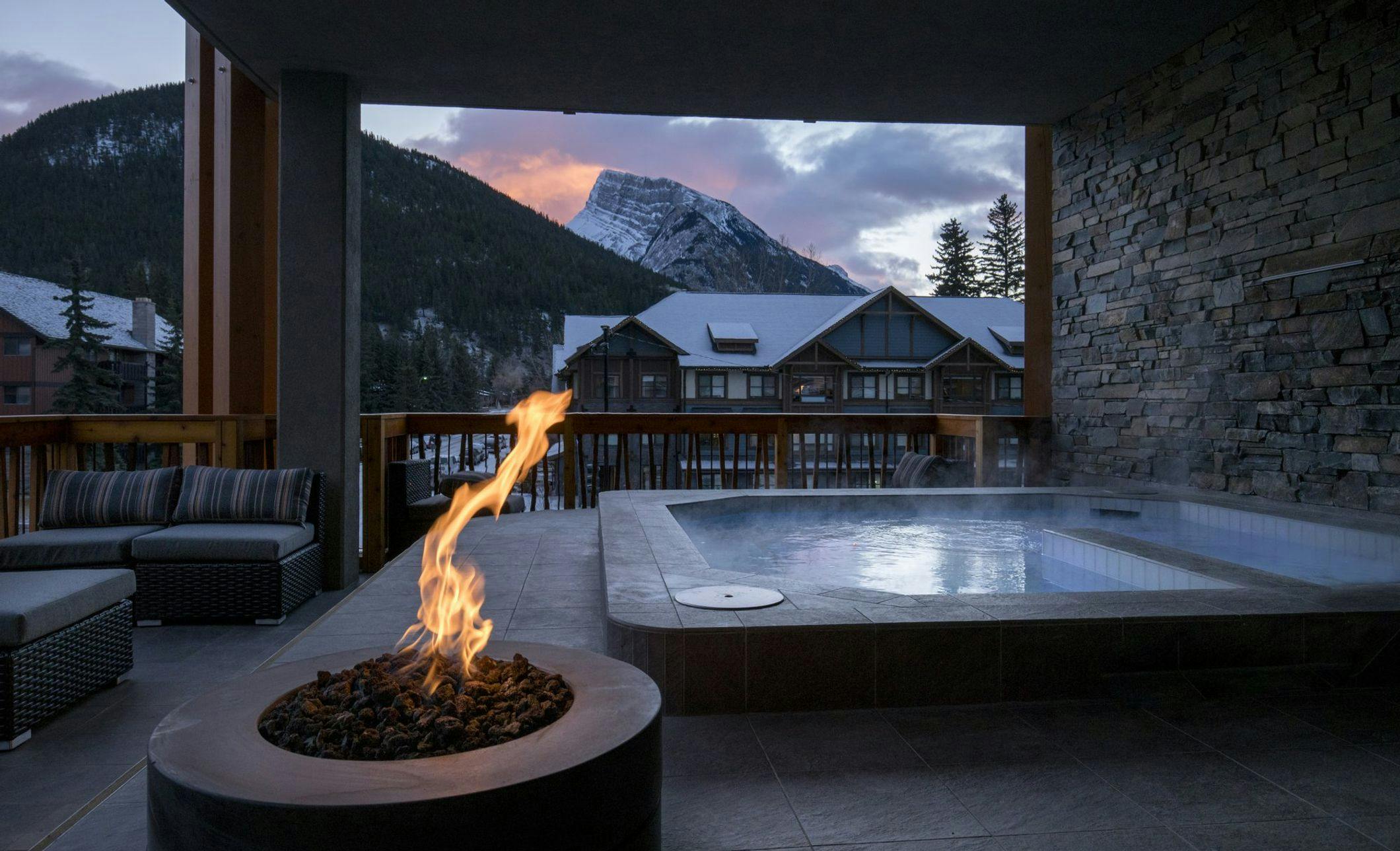 Rooftop Hot Tub with a firepit overlooking mountain vistas