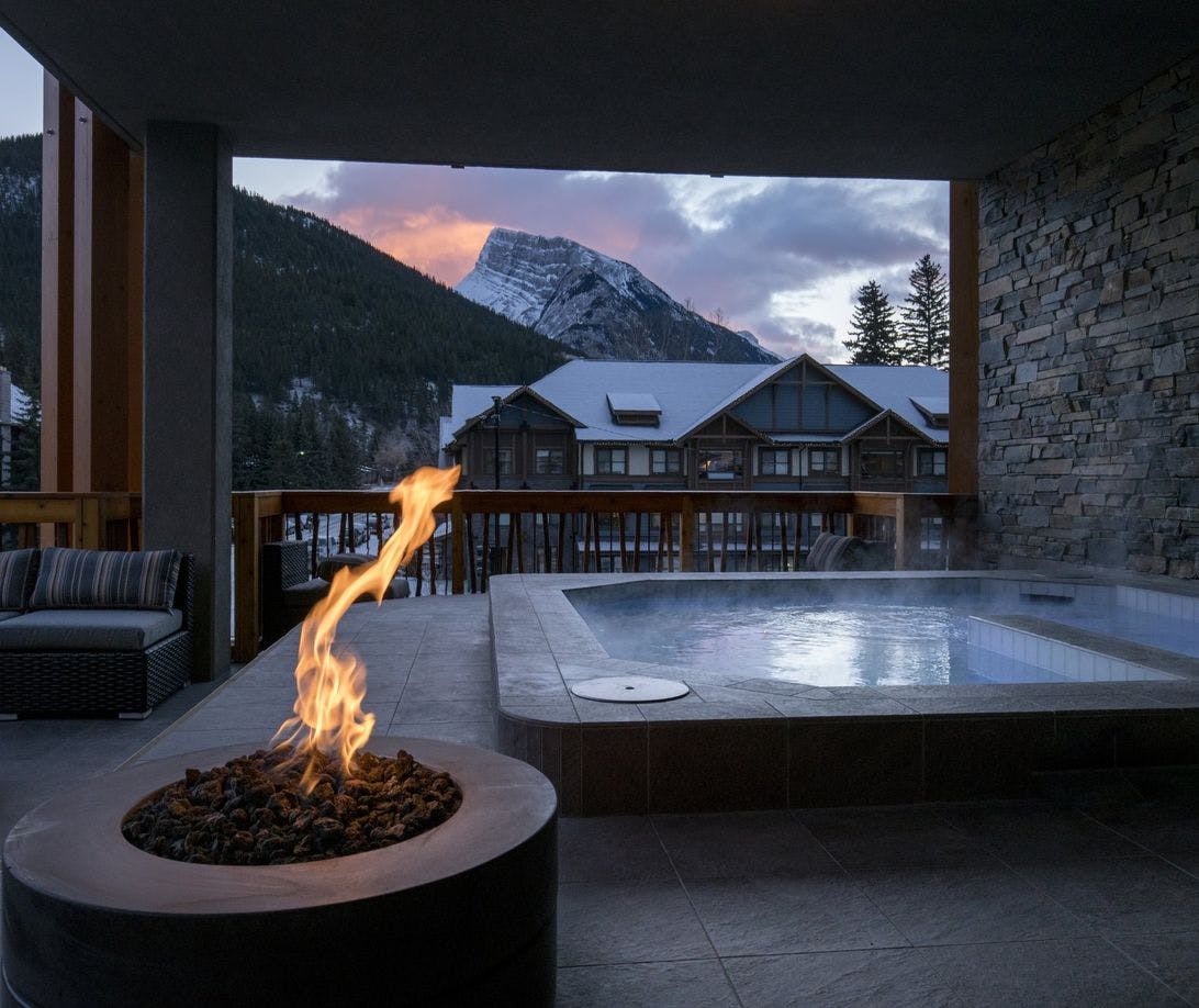 Rooftop Hot Tub with a firepit overlooking mountain vistas