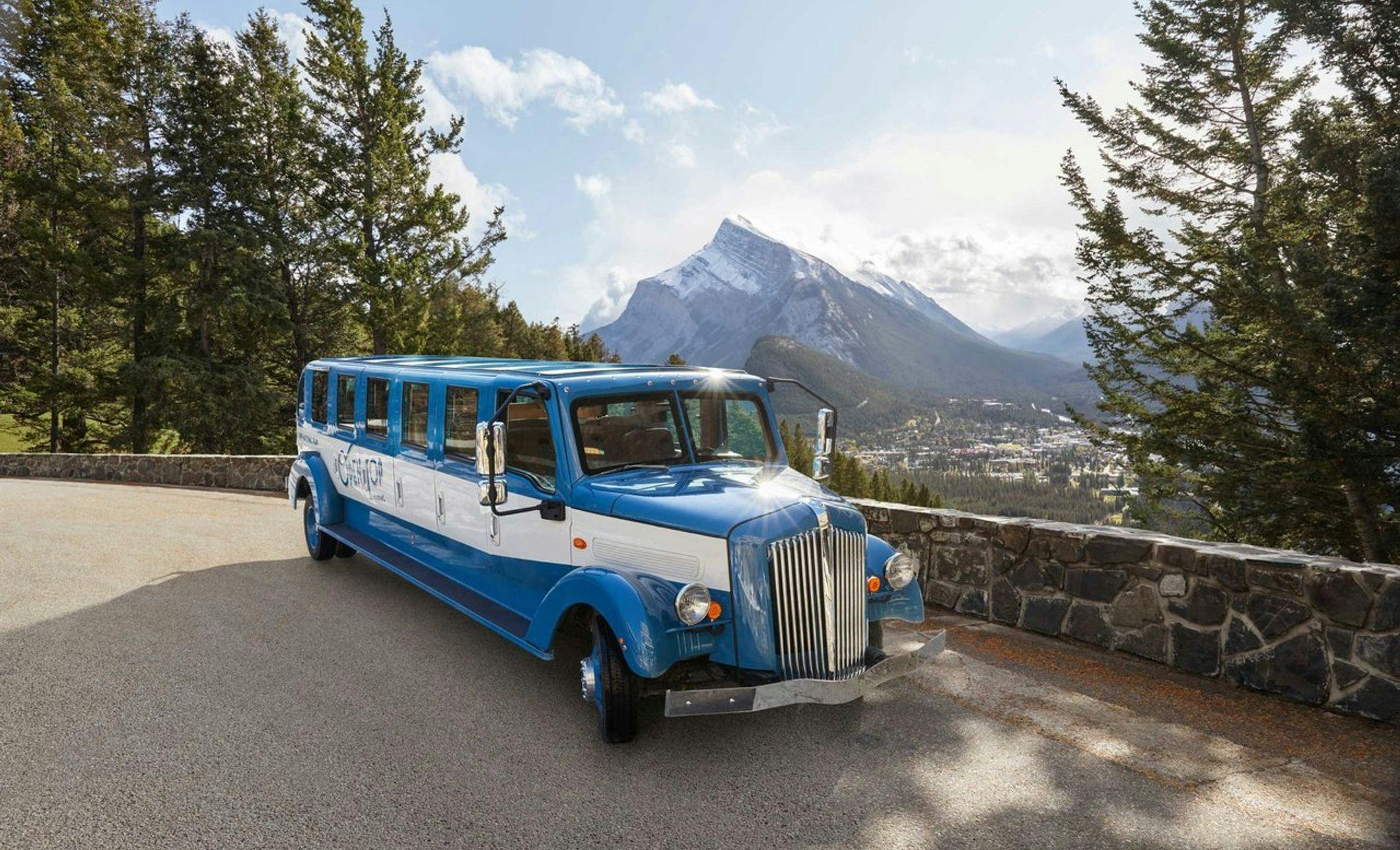 Pursuit&#039;s Open Top Touring bus sits on the Mt. Norquay viewpoint in Banff National Park